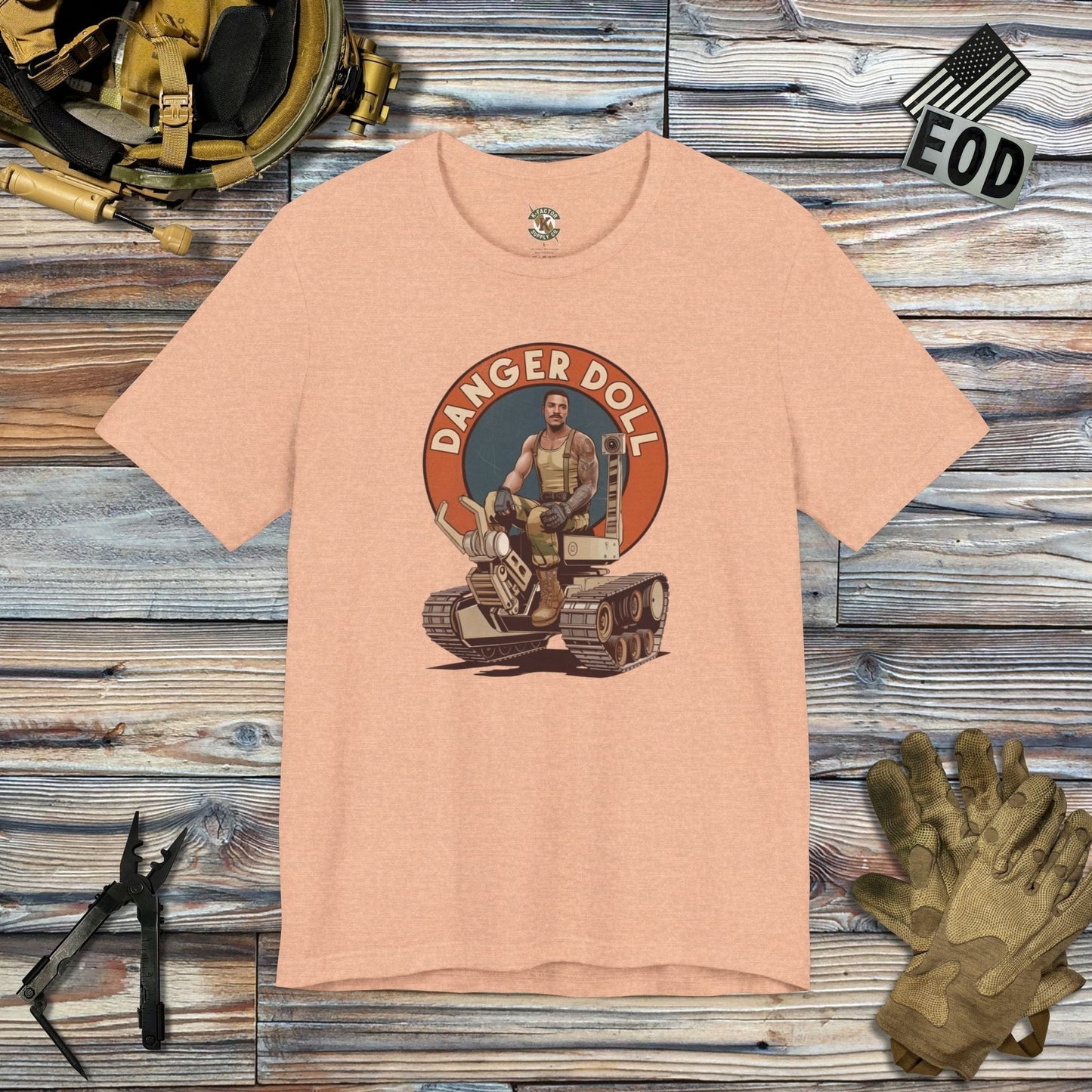 K-Factor Supply Co Danger Doll (Mk 1 Mod 3) T-Shirt Heather Peach / S