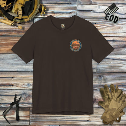 K-Factor Supply Co FOB Ghazni Travel (Back Print) T-Shirt Brown / S