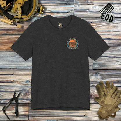 K-Factor Supply Co FOB Ghazni Travel (Back Print) T-Shirt Dark Grey Heather / S