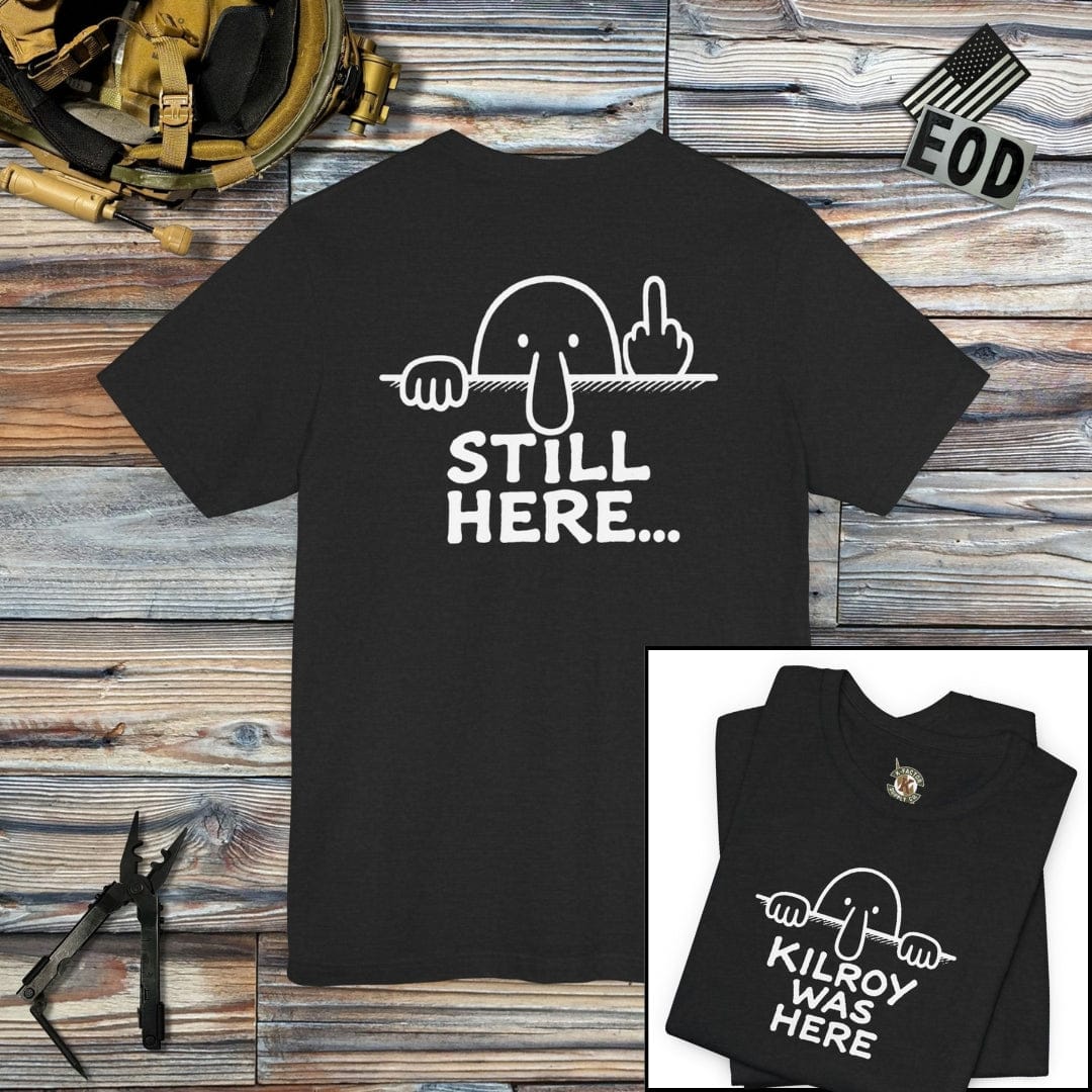 K-Factor Supply Co Kilroy - Still Here (Back Print) T-Shirt Dark Grey Heather / S