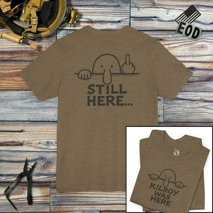 K-Factor Supply Co Kilroy - Still Here (Back Print) T-Shirt Heather Olive / S