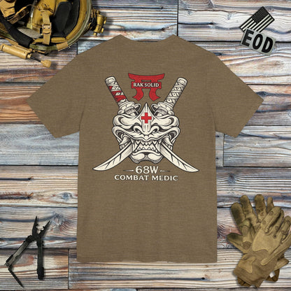 K-Factor Supply Co Rak Solid - 68 Whiskey (Back Print) T-Shirt Heather Olive / S