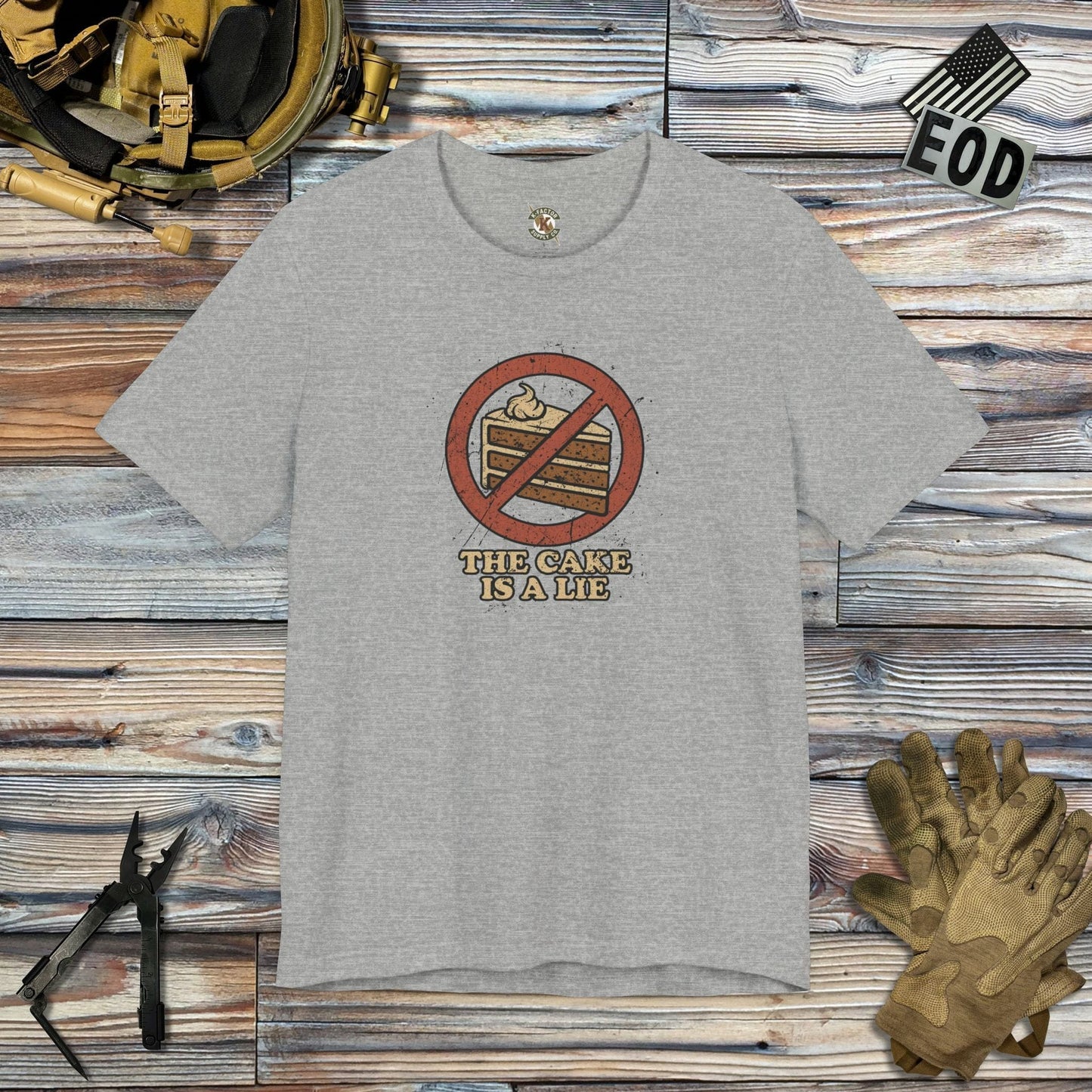 K-Factor Supply Co The Cake is a Lie T-Shirt Athletic Heather / S