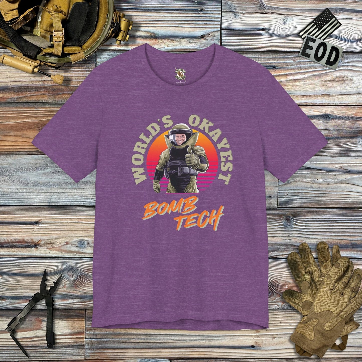 K-Factor Supply Co World's Okayest Bomb Tech Mk 1 Mod 0 T-Shirt Heather Team Purple / S
